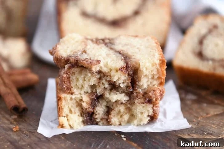 Cinnamon Bliss Loaf 3 Close-up of stacked cinnamon swirl quick bread slices.