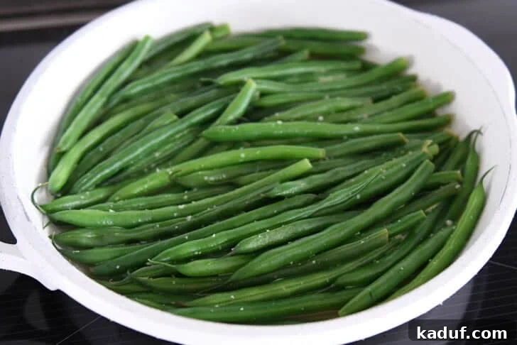 Lemon Garlic Sautéed Green Beans 4 Green beans cooking in a skillet