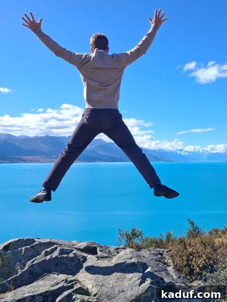 Friday Musings 6 Boy jumping off a rock. He looks like he is having fun.