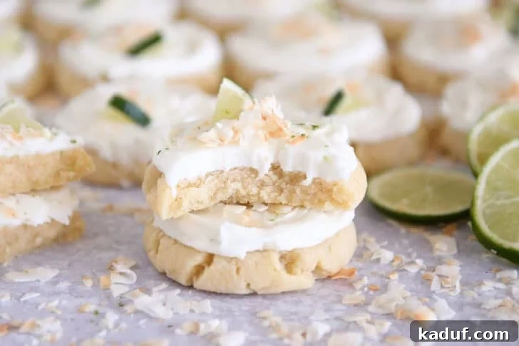 Finished coconut lime sugar cookies on a tray.