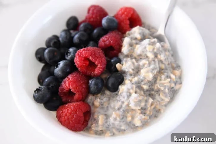 Midsummer Survival: Practical Tips to Stay Cool 9 White bowl with chia oats, blueberries, and raspberries.